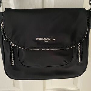 Black nylon crossbody purse, only worn once. Super stylish and cute